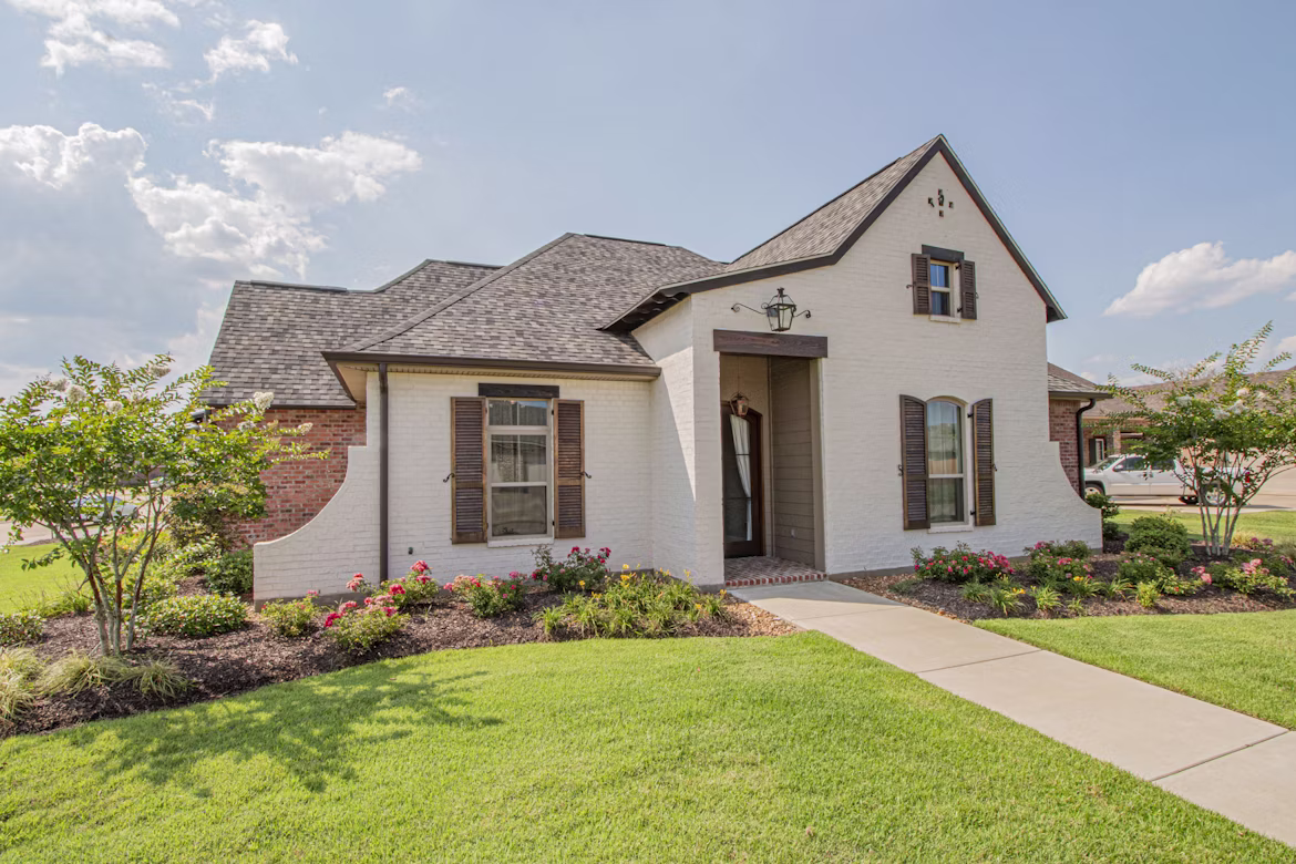 A well-kept front yard, mowed and tidy